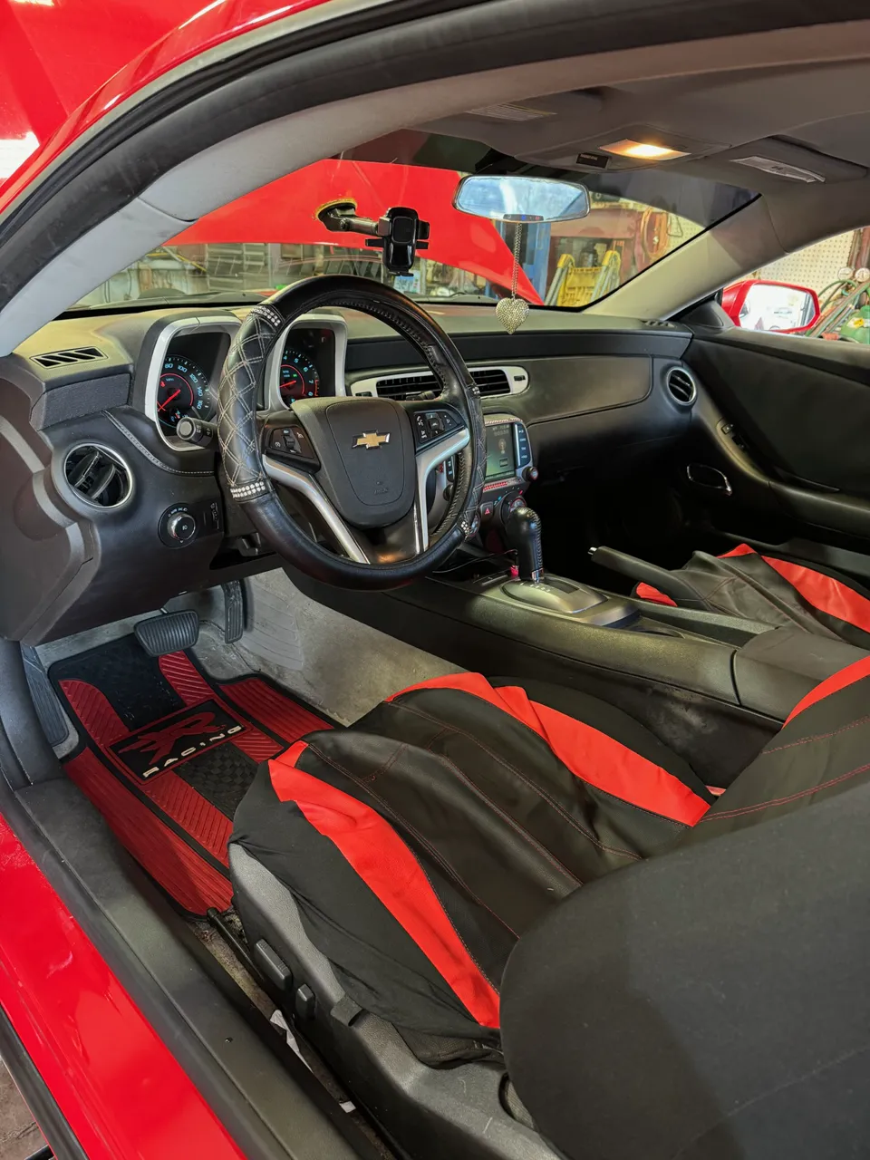 Red Chevrolet interior reassembled after repair